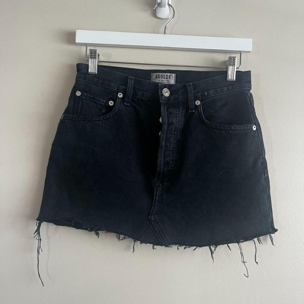 AGOLDE black denim mini skirt size 26 raw hem button fly faded wash 90s grunge
